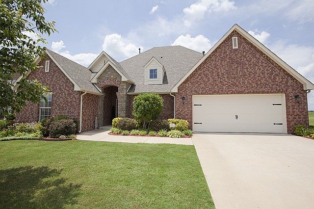 Elegant Brick and Stone Bixby Cottage
