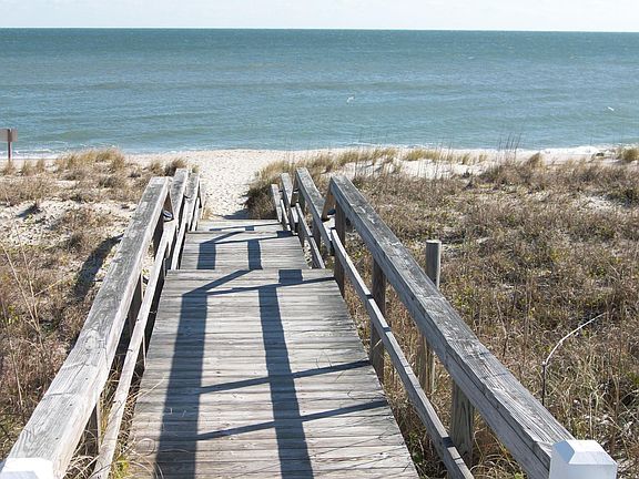 Private community beach access 2 blocks away with parking, bathrooms, and gazebo.