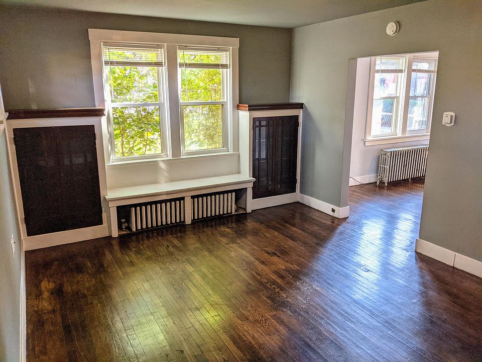 Dining room with built in cabinets and bench