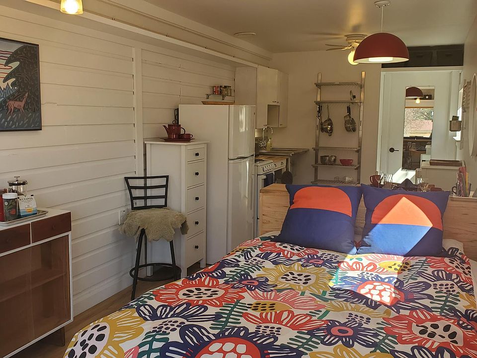 This sunny unit in Bayfield Commons comes with all the furniture you see