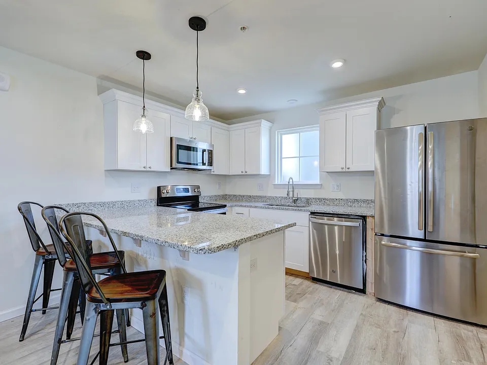 Kitchen and Bar with stainless steel appliances