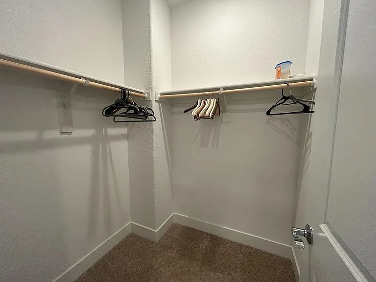 Walk in closet in Primary bedroom