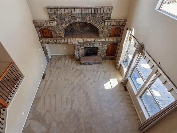 Grand family room with soaring ceilings to the second level!