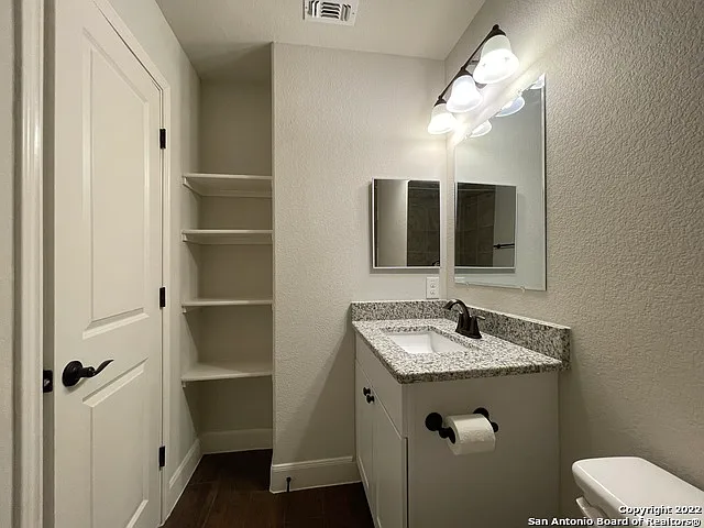 6423 Melanzane Ave #104 — Photo 12