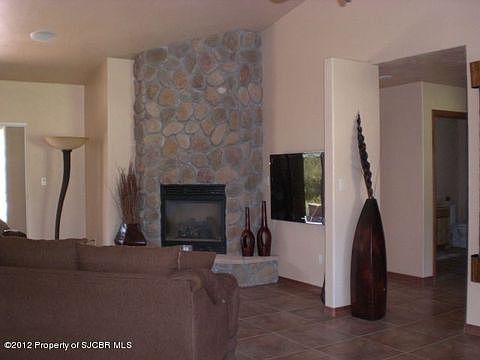 The beautiful fireplace greets you with a warm fire