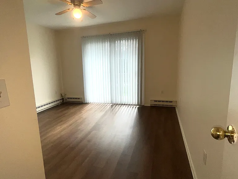 Bedroom 1, large closet and sliding door to second private balcony