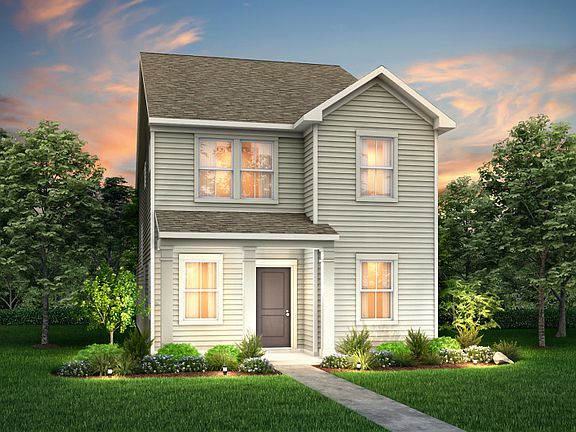 Wylie Exterior 1 features siding, covered front sitting porch and 2 car rear load garage
