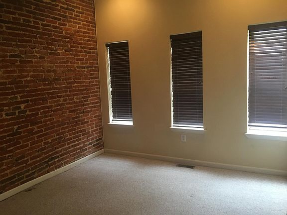 Master Bedroom with Exposed Brick