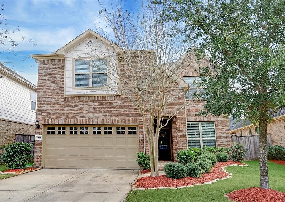 Open concept home with soaring ceilings featuring 4 bedrooms, 2 1/2 bathrooms Game Room, Media Nook and Study in the Master Planned Community of Cinco Ranch with many community amenities.