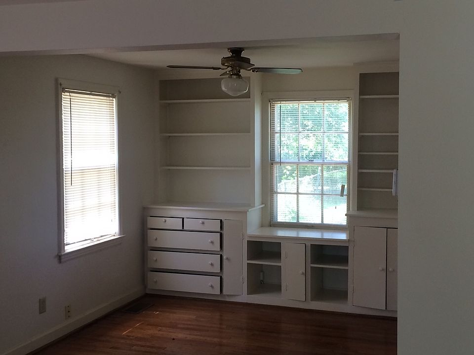 Open Light Living Room - Dining Room features Built-ins