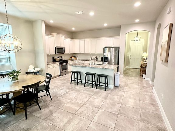 open concept dining and kitchen area