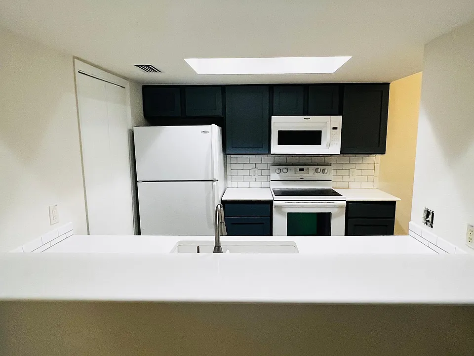 Open concept kitchen to living room.