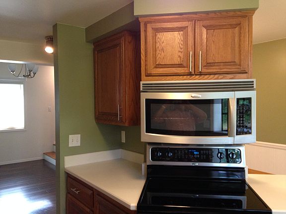 Microwave and stove.