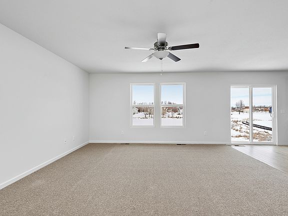 The family room is spacious and well lit