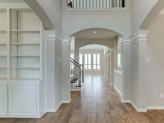 As you step into the tall foyer, you have the study to your left and formal dining room to your right.