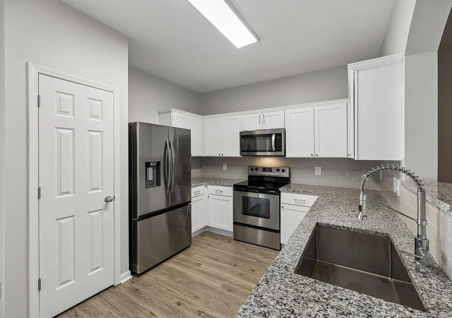 Updated 3-Bedroom Brentwood Townhome with Garage & Private Patio — Photo 4