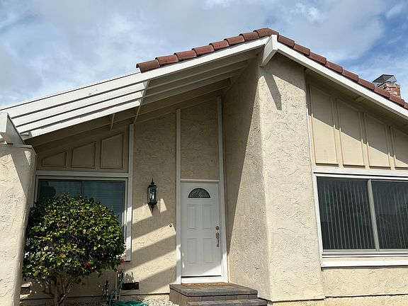 A modern entry with original lines.