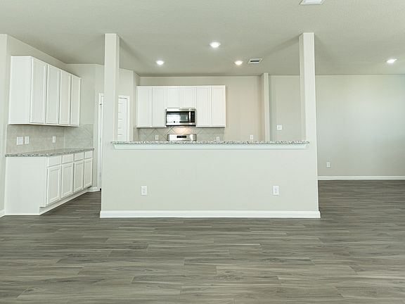 Family Room to Kitchen and Dining Area