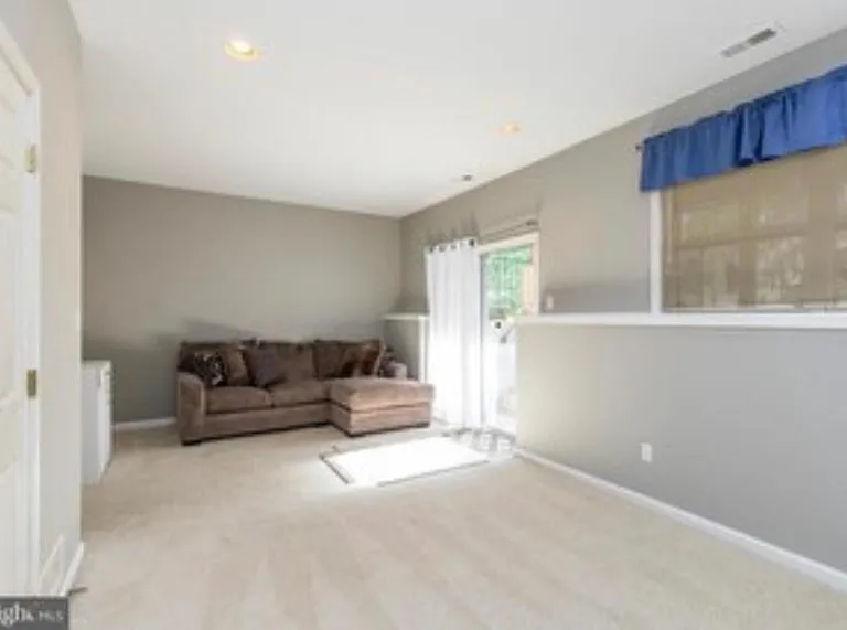 Basement Bonus Room with access to backyard.
