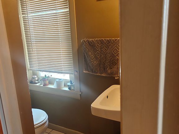 Half bathroom off kitchen on first floor