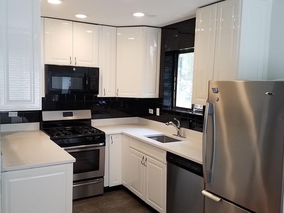 Newly renovated kitchen with quartz countertops