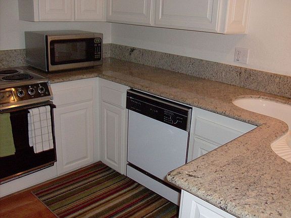kitchen with granite and hardwood floors