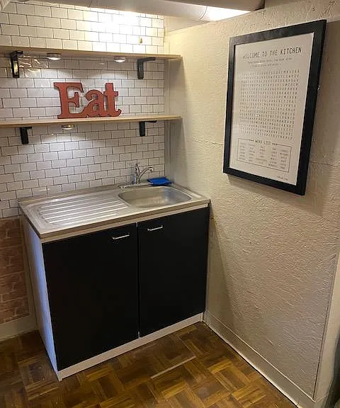 NEW sink with integrated drain board and task lighting