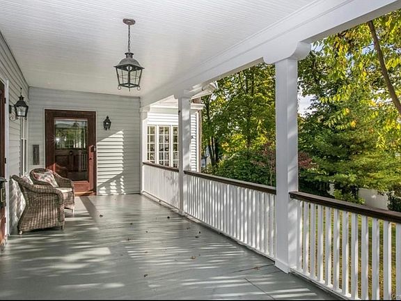 Renter's private front porch overlooking the lawn.