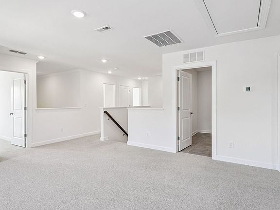 The loft conveniently leads to each upstairs bedroom.