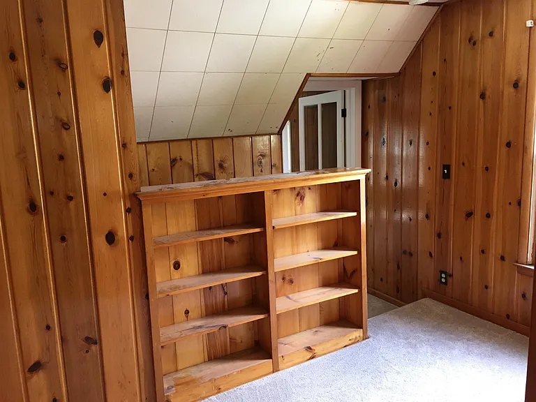 Built in cabinets in the upstairs hallway.