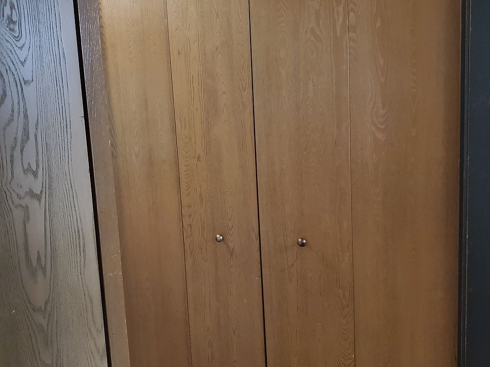 Multiple closets in hallway leading to the bedrooms.