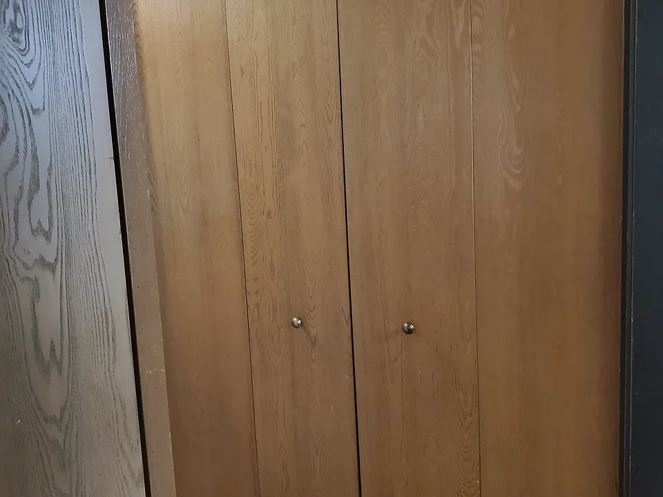 Multiple closets in hallway leading to the bedrooms.