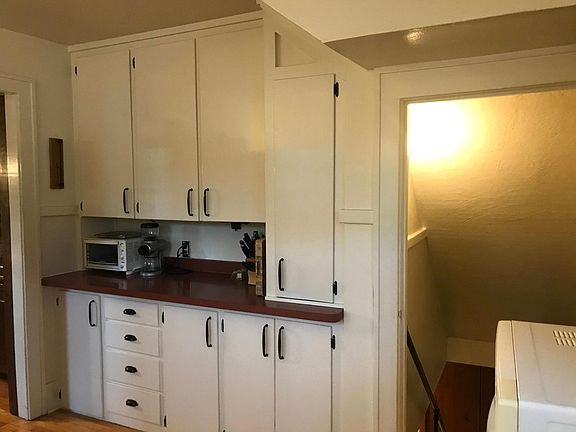 Kitchen, cabinet view. Hanging pot storage (not shown).