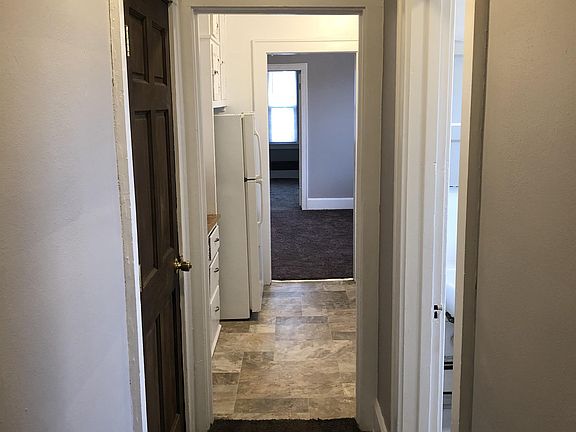 Hallway from back bedroom through to front