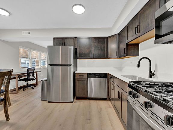Kitchen is stocked with cooking essentials. Basic cookware, utensils, and flatware provided.