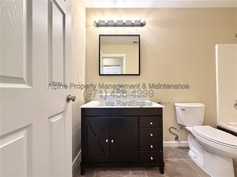 5758 NE Damsel Dr — Photo 19