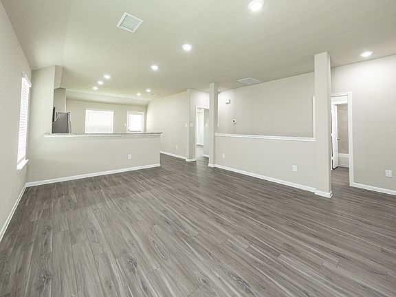 Family Room to Kitchen and Dining Area