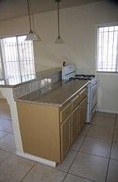 4th image of 11734 Berendo Ave