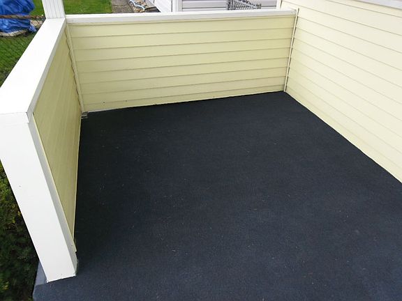 Rear carpeted porch