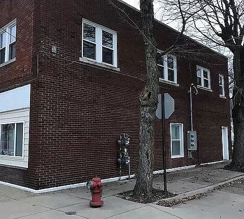 Side Entrance to lower unit and shared basement.