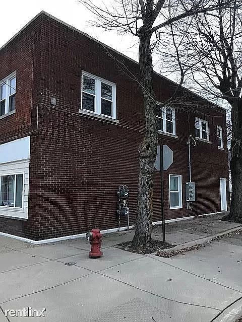 Side Entrance to lower unit and shared basement.