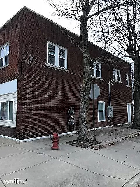 Side Entrance to lower unit and shared basement.