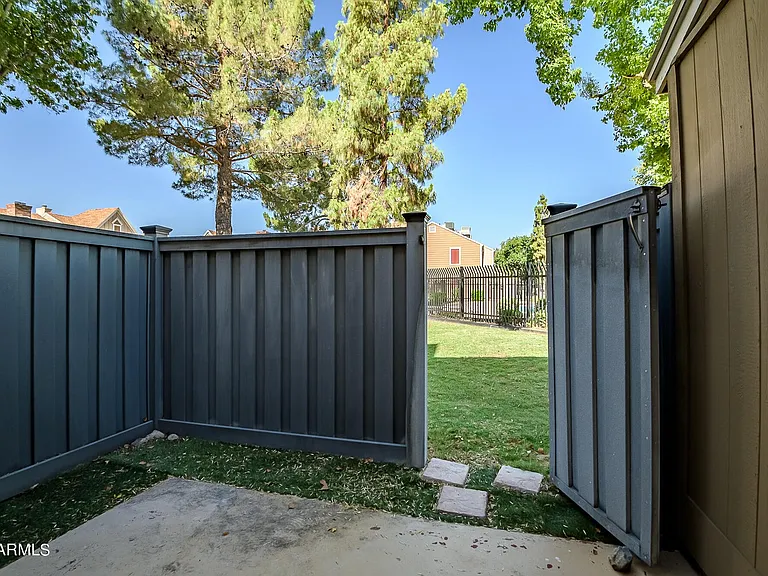 Private patio with gates that lead to the pool.