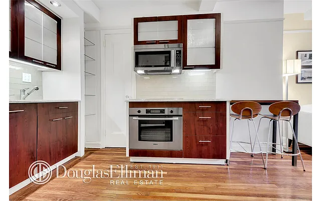 Sold by Douglas Elliman | media 10