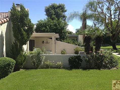 Wonderful setting with park-like greenbelt, mature citrus and mountain views.