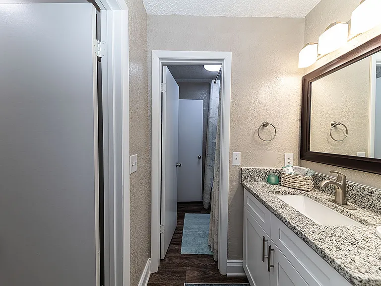 Bright bathroom with granite counters