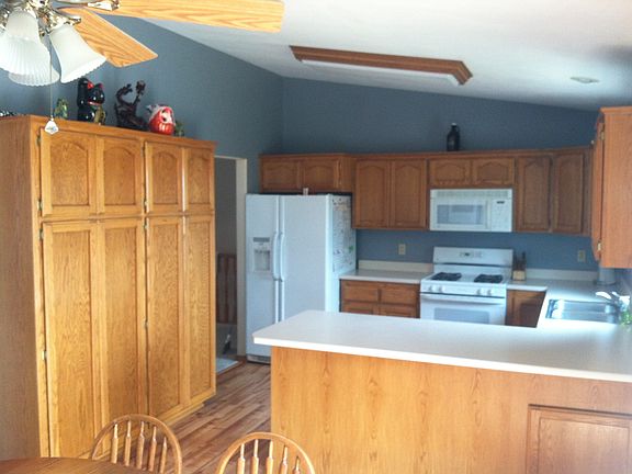 Kitchen with vaulted ceilings