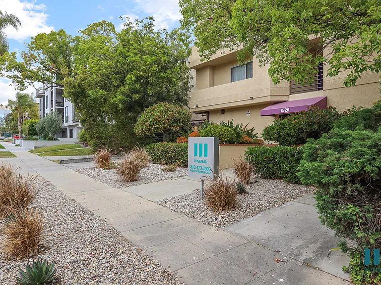 Sidewalk View of Overland Century by Wiseman