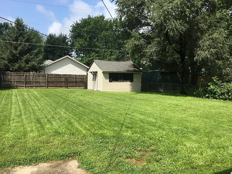 Shed for storage and fenced backyard