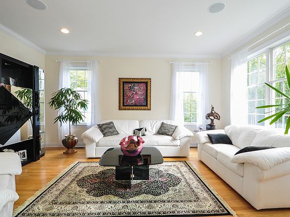 Formal living room. Welcoming, cozy, and bright!